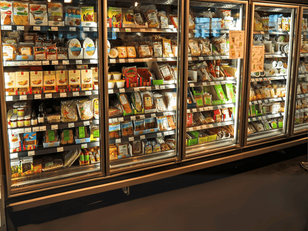 Display fridge stocked with a variety of chilled beverages